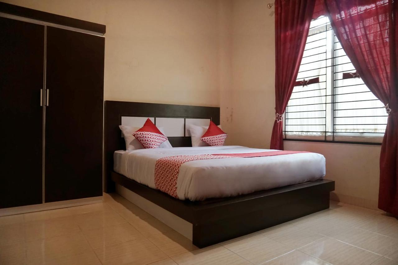 Oyo 1394 Rumaisa Homestay Syariah بيكانبارو المظهر الخارجي الصورة